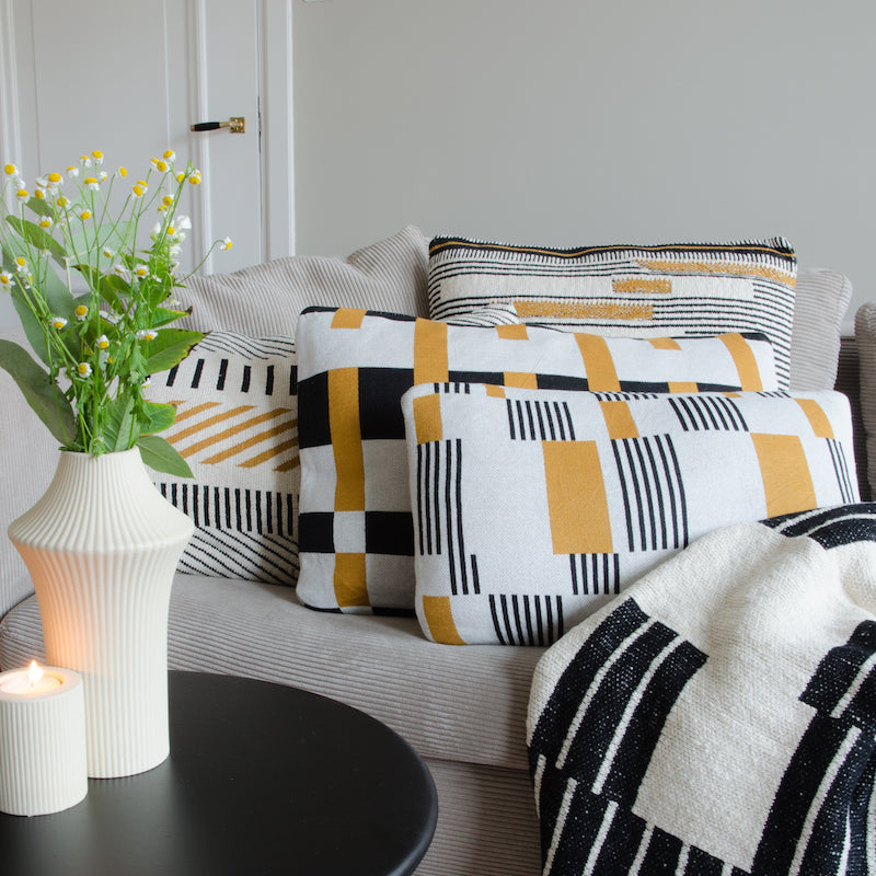 Strickdecke / Plaid schwarz-creme Muster 120x150cm